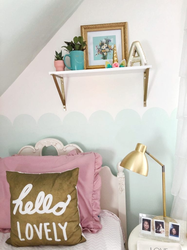 A few simple items, plus furniture rearrangement update this little girl's bedroom. 